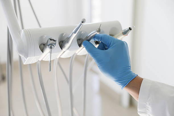 Professional Dental Implants technician working in Polk County County, AR